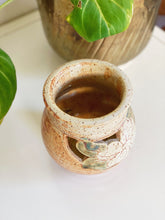 Load image into Gallery viewer, Vintage Earth Tone Speckled Ceramic Jar with Floral Cut Out Design