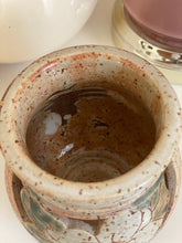 Load image into Gallery viewer, Vintage Earth Tone Speckled Ceramic Jar with Floral Cut Out Design
