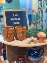 Load image into Gallery viewer, Pair of Two Wooden Tribal Face Carved Wooden Mugs
