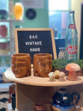Load image into Gallery viewer, Pair of Two Wooden Tribal Face Carved Wooden Mugs
